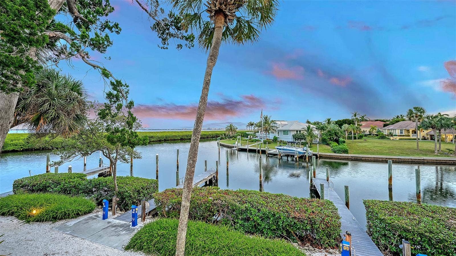 YOU ARE JUST STEPS AWAY FROM YOUR PRIVATE DOCK W/ POWER & WATER