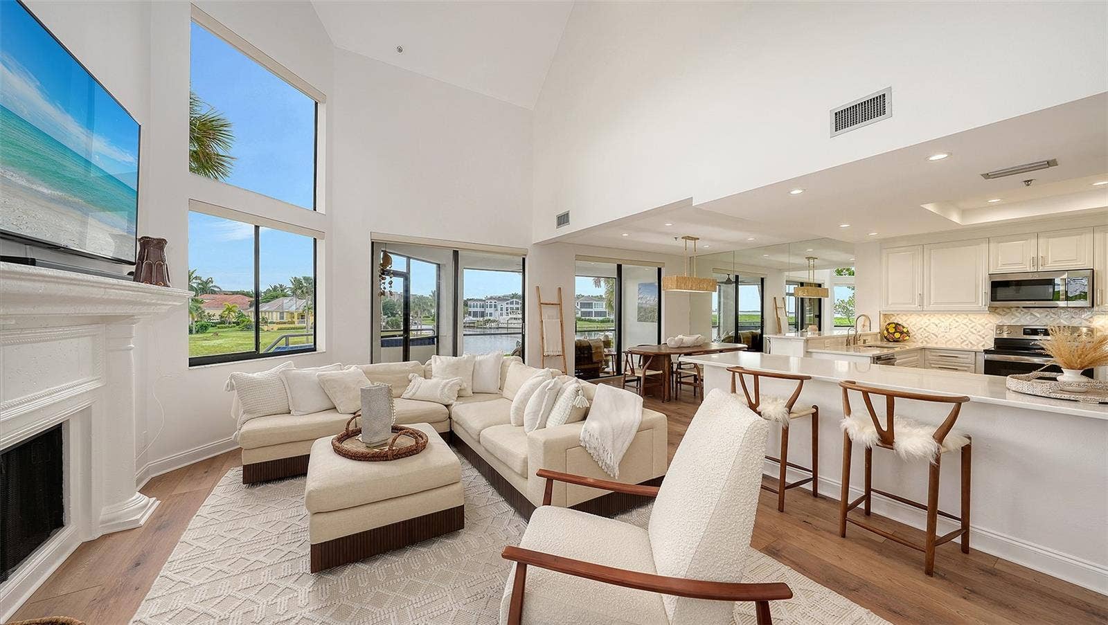 ENJOY THE SOFLTY FURNISHED GREAT ROOM ENJOYING A MOVIE
