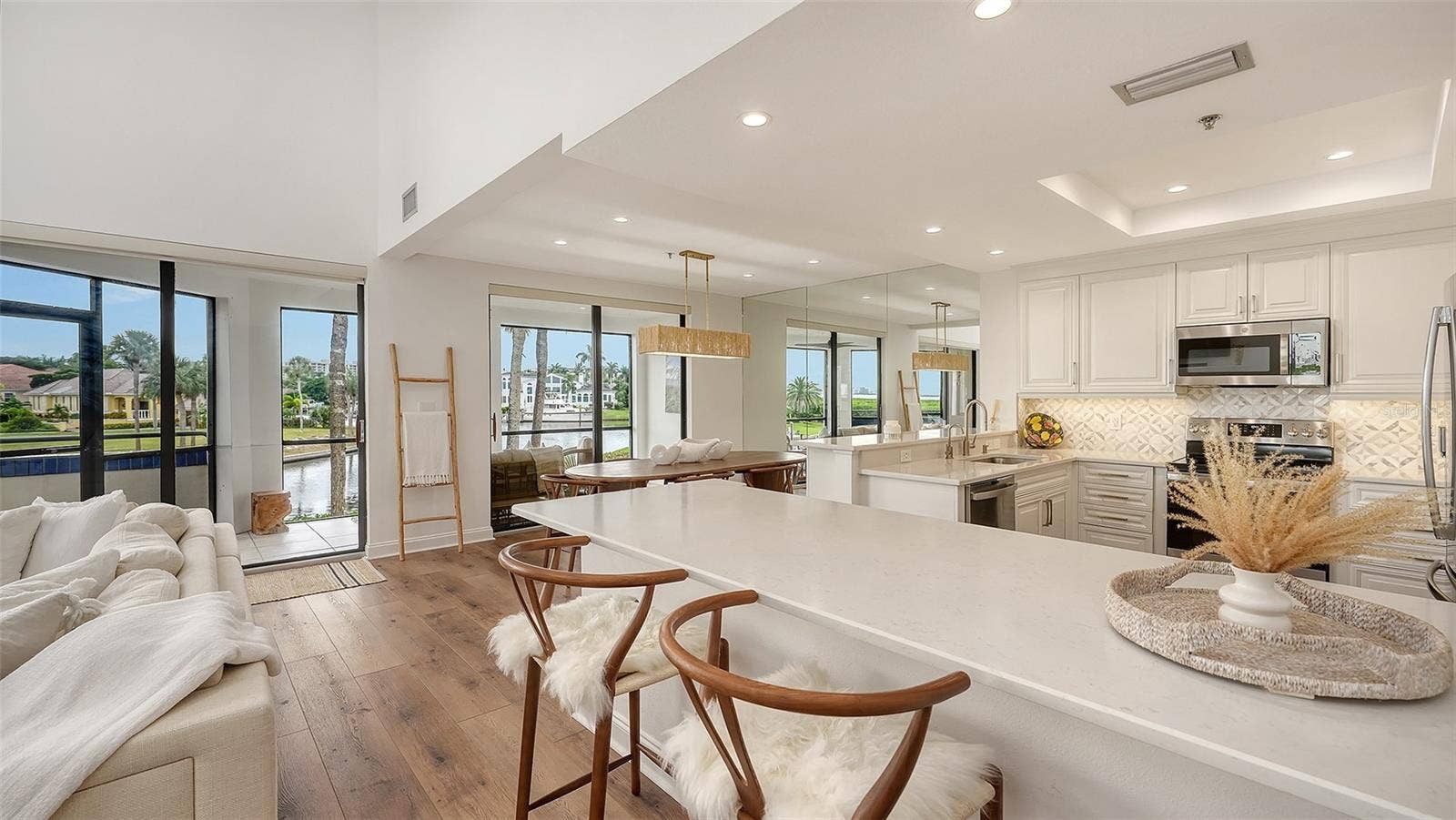 THE KITCHEN ISLAND IS A FUN ENTERTAINING AREA