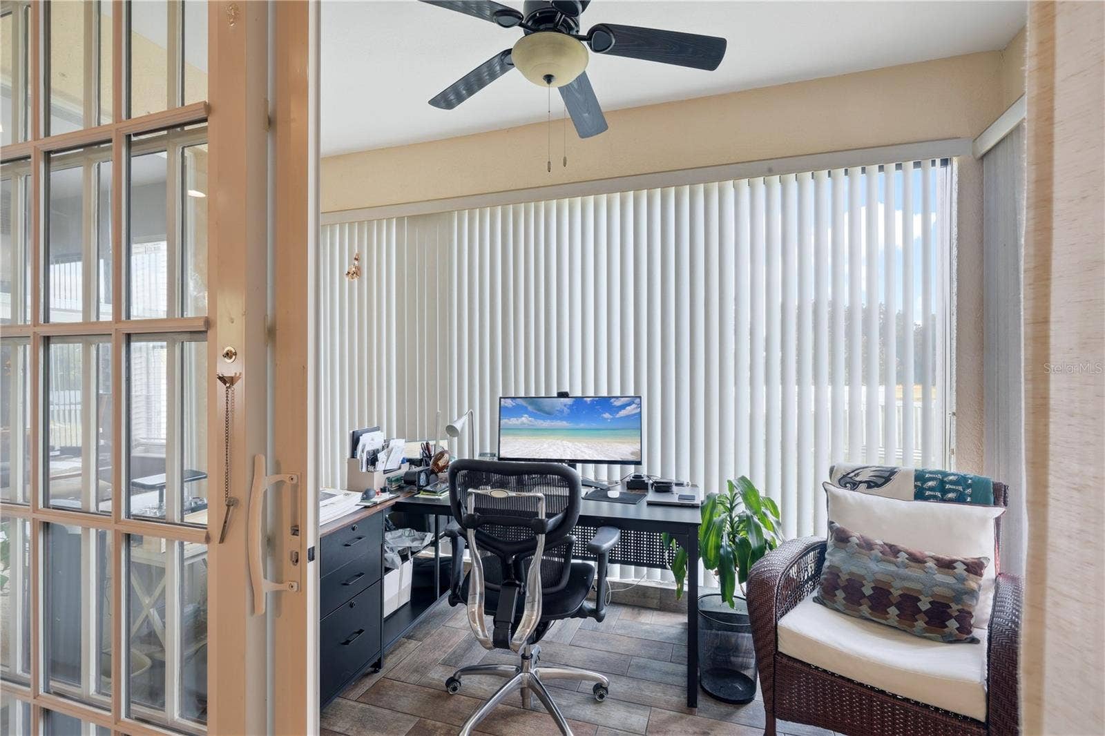 5310 72ND STREET E, Palmetto, FL 34221 Florida room currently used as an office. It is air conditioned space.