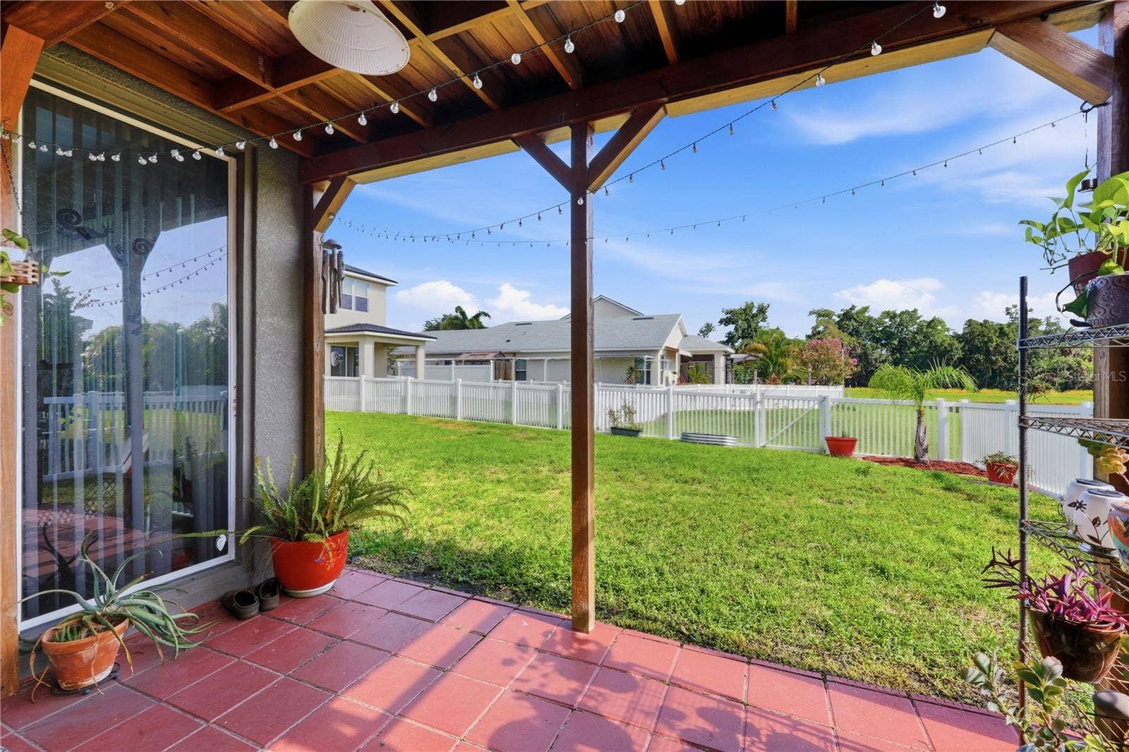 5310 72ND STREET E, Palmetto, FL 34221 Lovely Covered Terrace with fenced yard