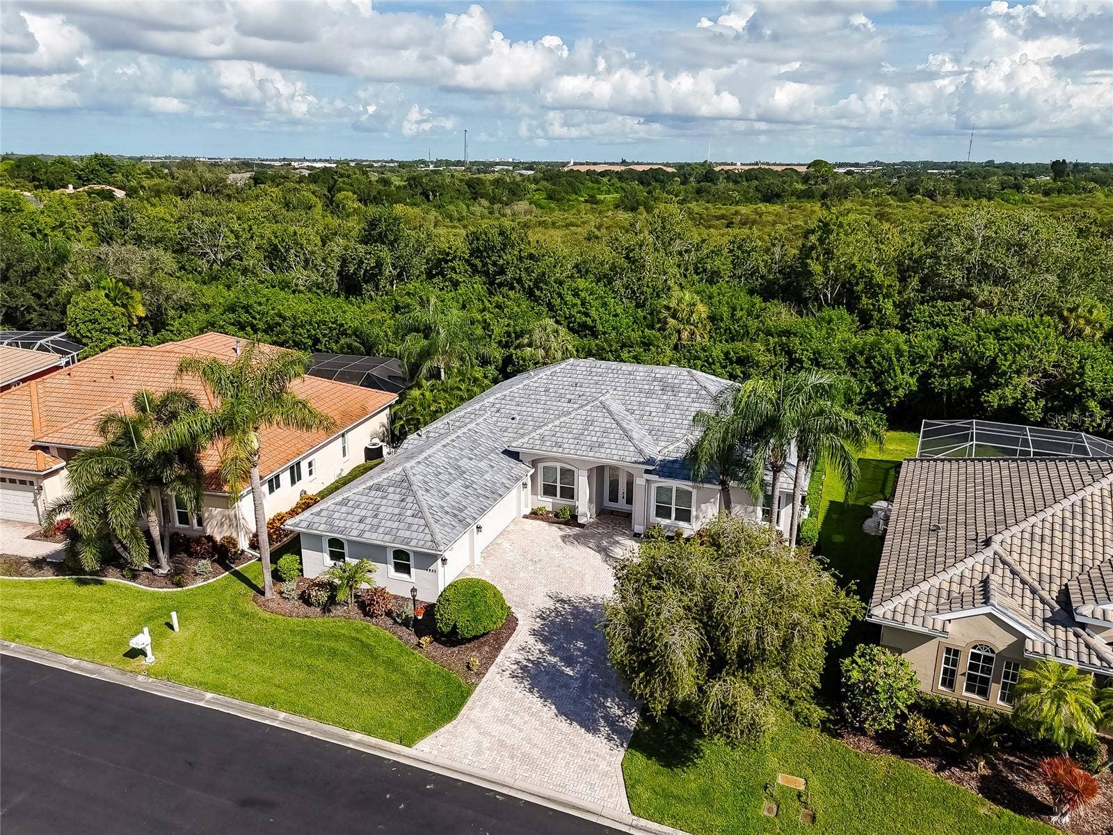 4953 GARDINERS BAY CIRCLE, Sarasota, FL 34238 Gated, 2026 tile roof, impact glass, 3 car garage & pvt. mail box.