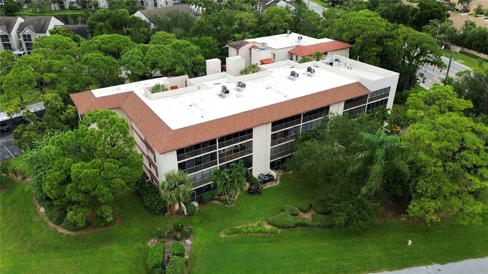 7500 40TH AVENUE W, #105, Bradenton, FL 34209 Exterior aerial view of the back of the building.