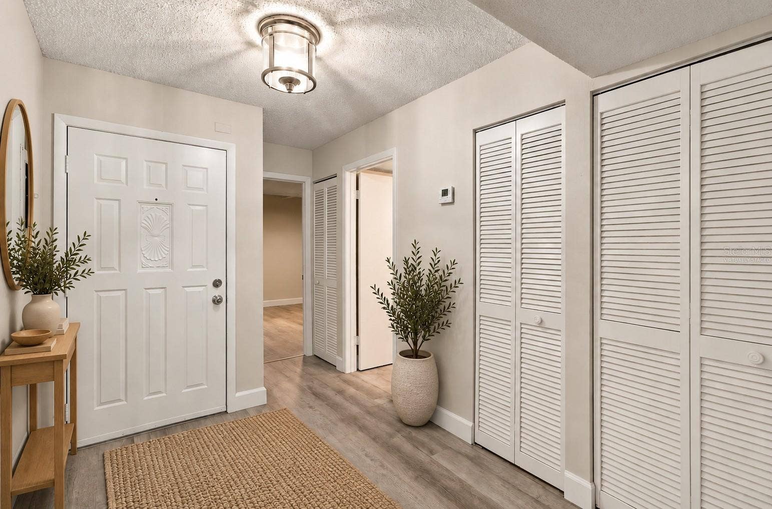 7500 40TH AVENUE W, #105, Bradenton, FL 34209 Foyer - Virtually Staged