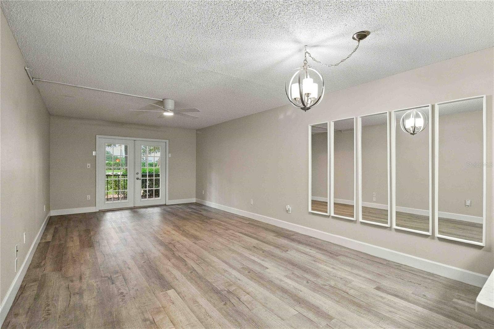 7500 40TH AVENUE W, #105, Bradenton, FL 34209 Living Room and Dining Room