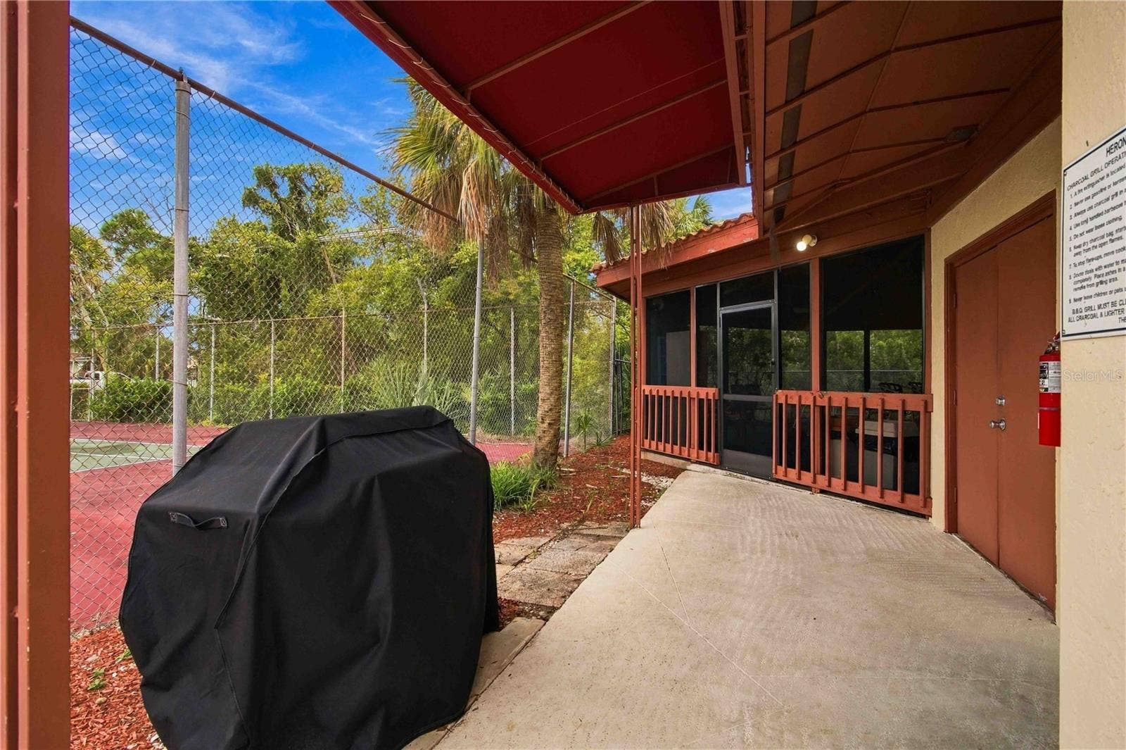 7500 40TH AVENUE W, #105, Bradenton, FL 34209 Clubhouse Exterior with BBQ Grill