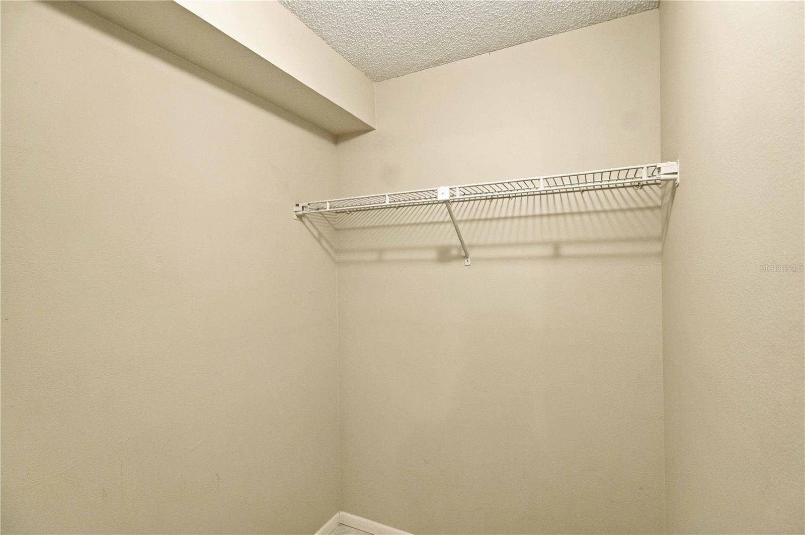 7500 40TH AVENUE W, #105, Bradenton, FL 34209 Primary Suite Walk-In Closet