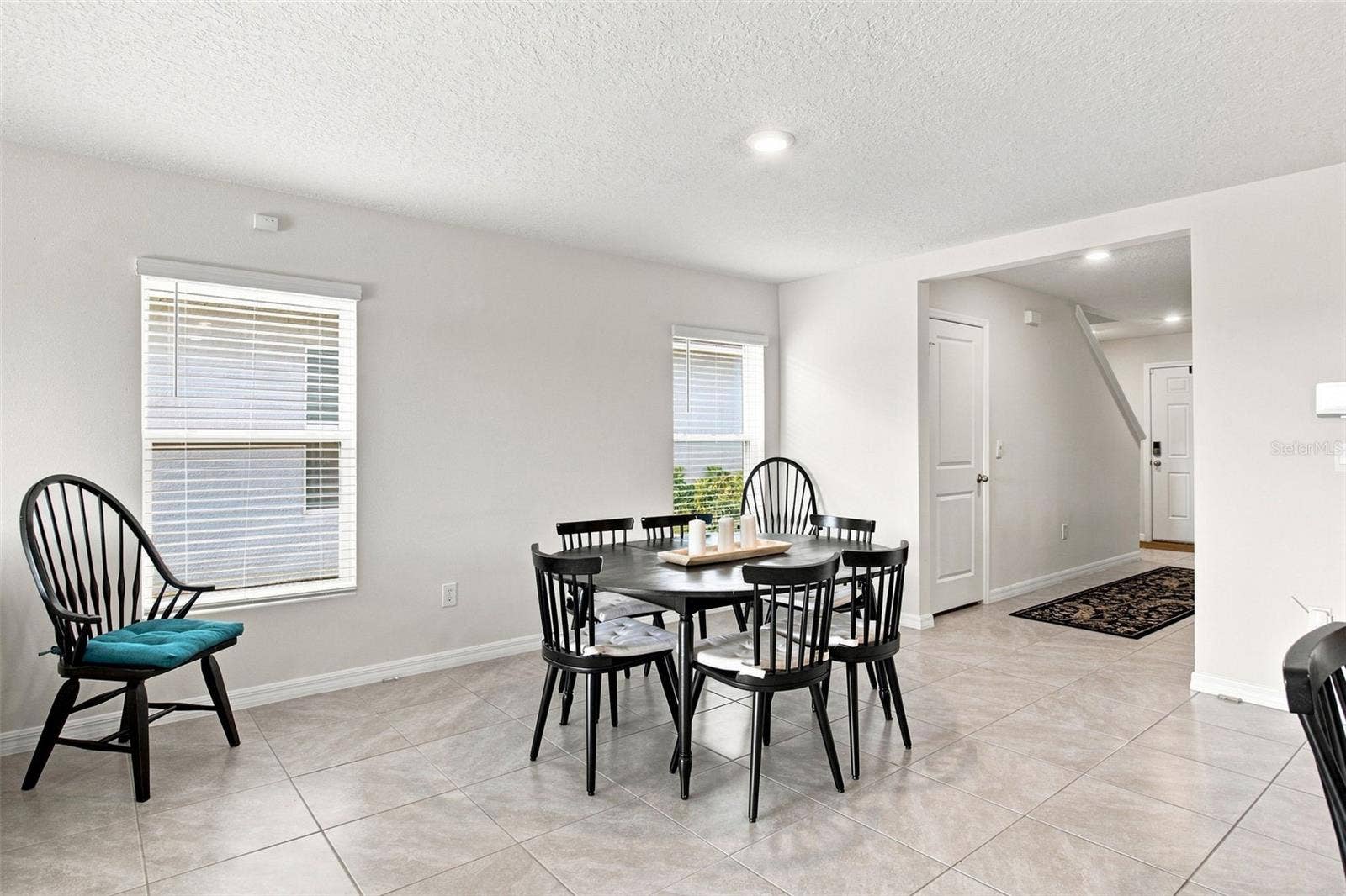 6118 DISTANT HAZE PLACE, Palmetto, FL 34221 Dining area adjacent to the kitchen and countertop seating