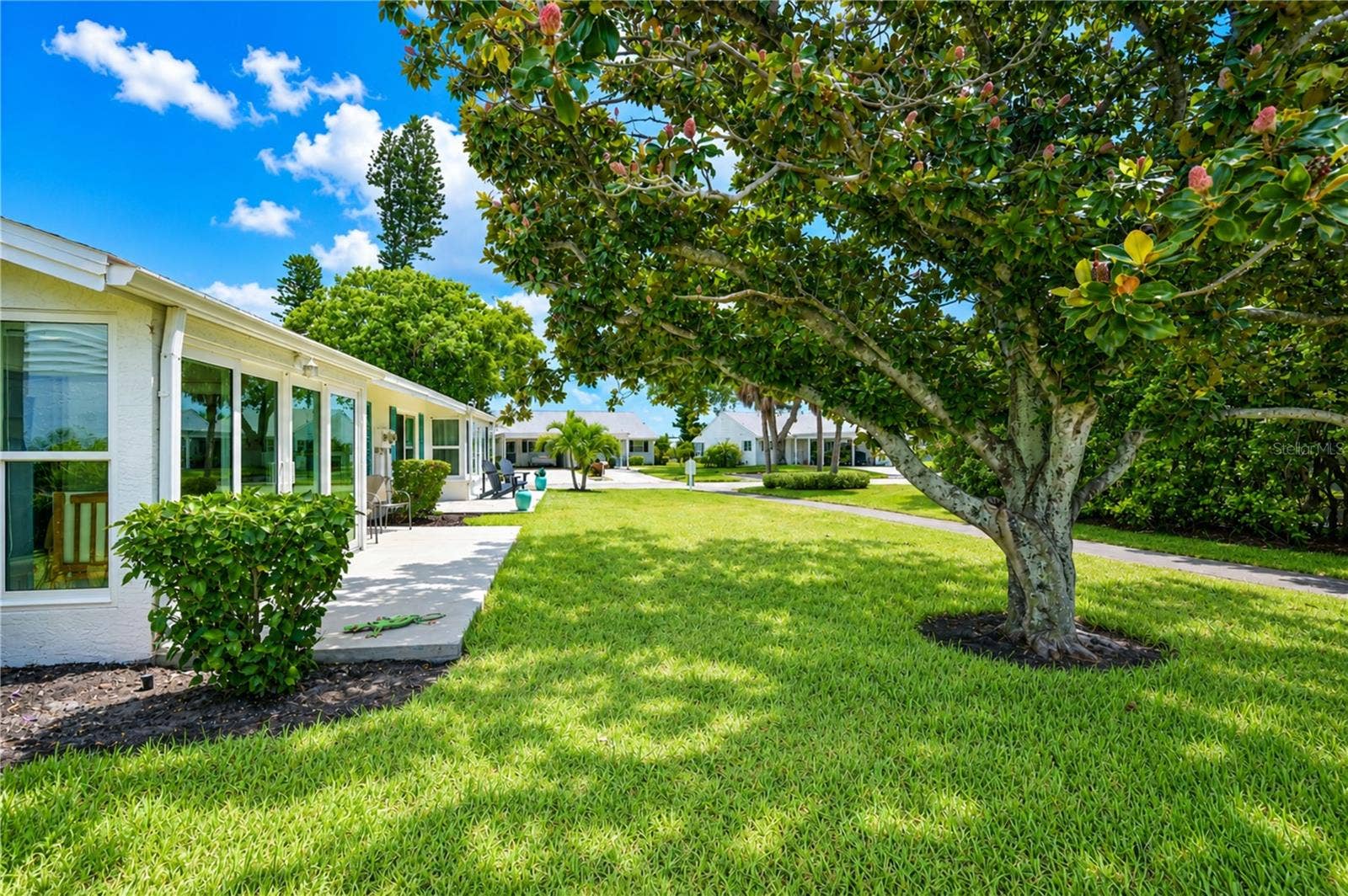 9406 ANDOVER CIRCLE, Bradenton, FL 34210 Across back of villa left