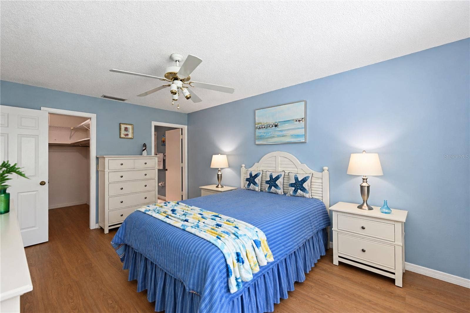 9406 ANDOVER CIRCLE, Bradenton, FL 34210 Primary bedroom to walk-in closet and ensuite bathroom