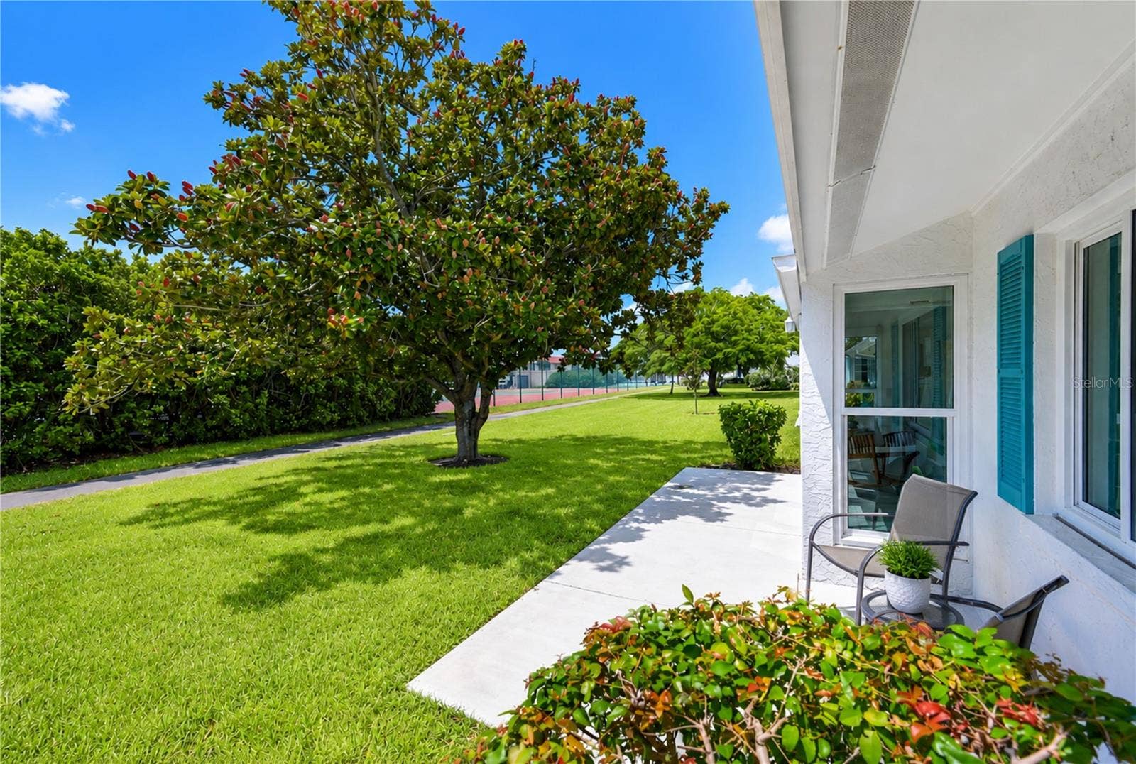 9406 ANDOVER CIRCLE, Bradenton, FL 34210 Across back of villa right