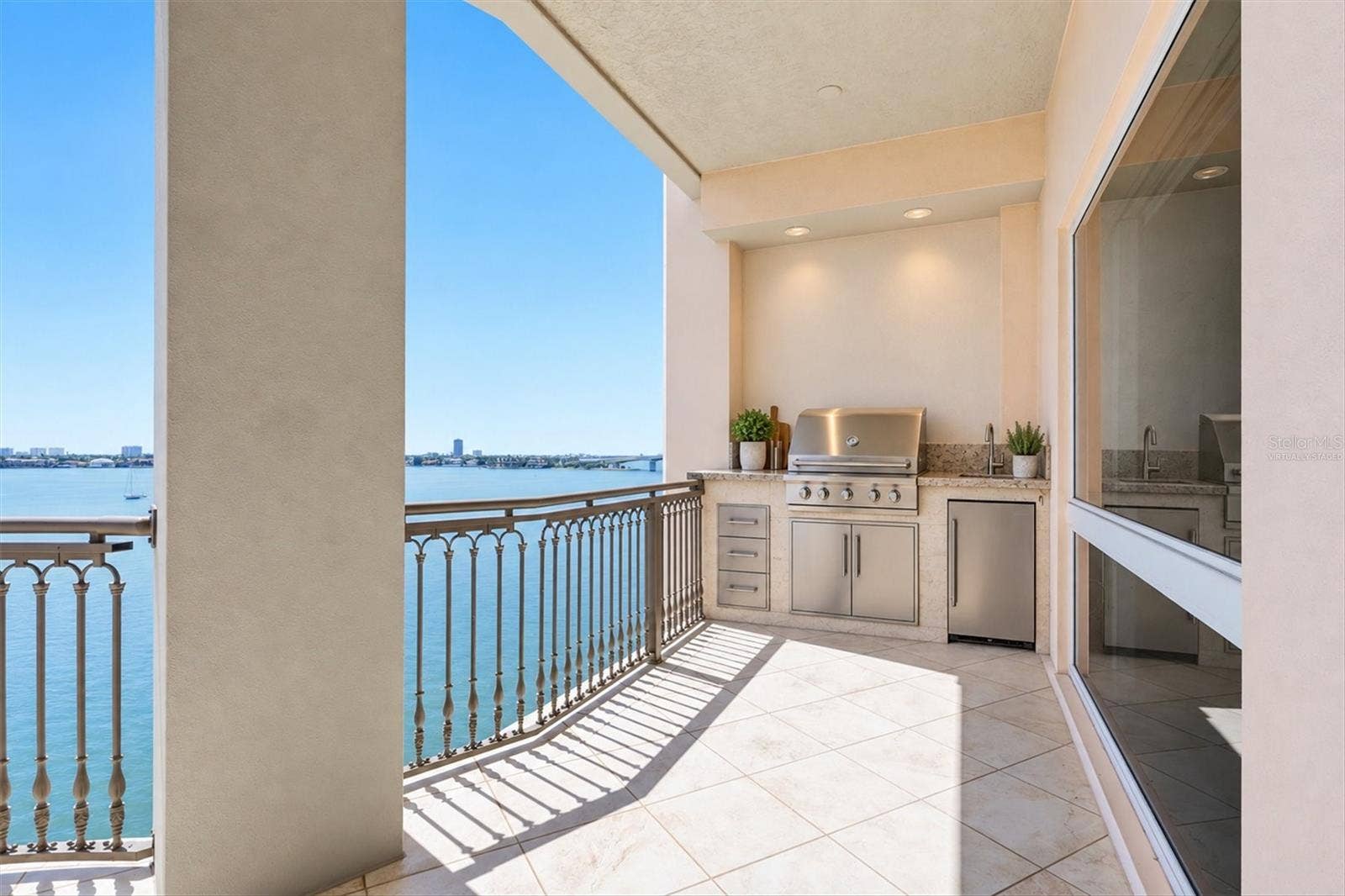420 GOLDEN GATE POINT, #700, Sarasota, FL 34236 Virtually Staged Outdoor Kitchen. Gas & Plumbing Hookups In Place