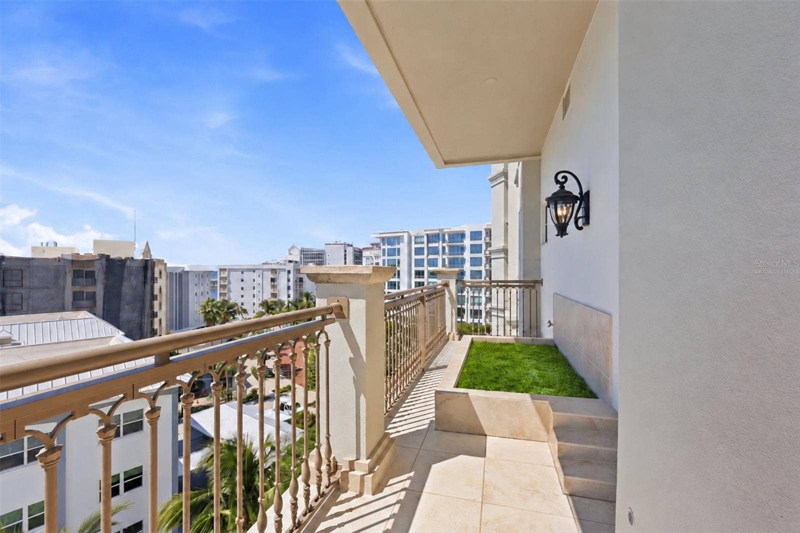 420 GOLDEN GATE POINT, #700, Sarasota, FL 34236 Virtually Staged (grass added) Pet Relief Area or Potential Garden