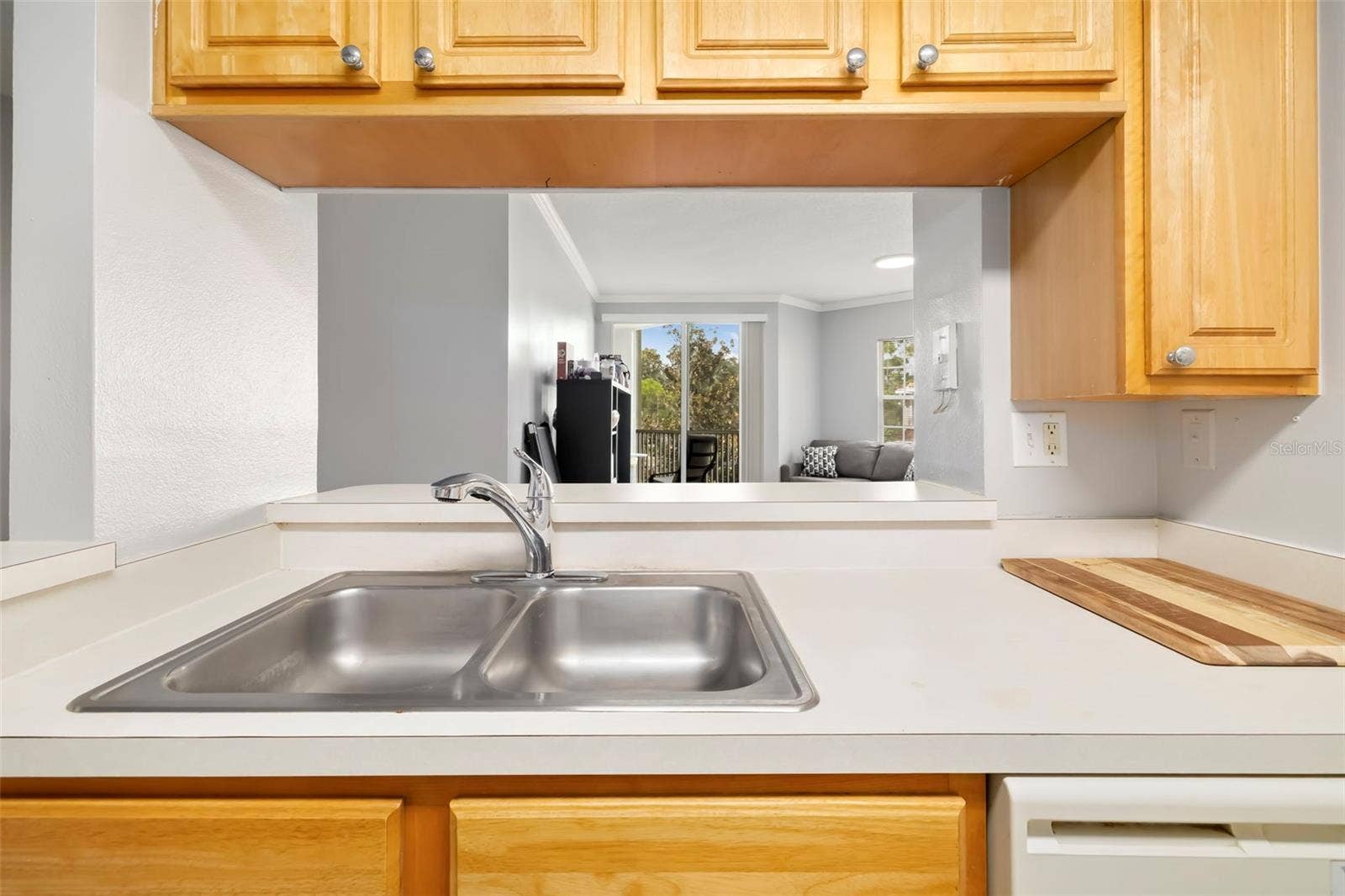 5500 BENTGRASS DRIVE, #6-203, Sarasota, FL 34235 Kitchen to Living Room.