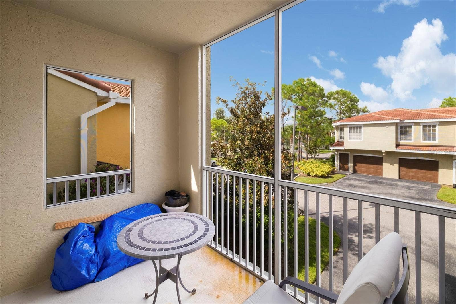 5500 BENTGRASS DRIVE, #6-203, Sarasota, FL 34235 Screened Lanai.