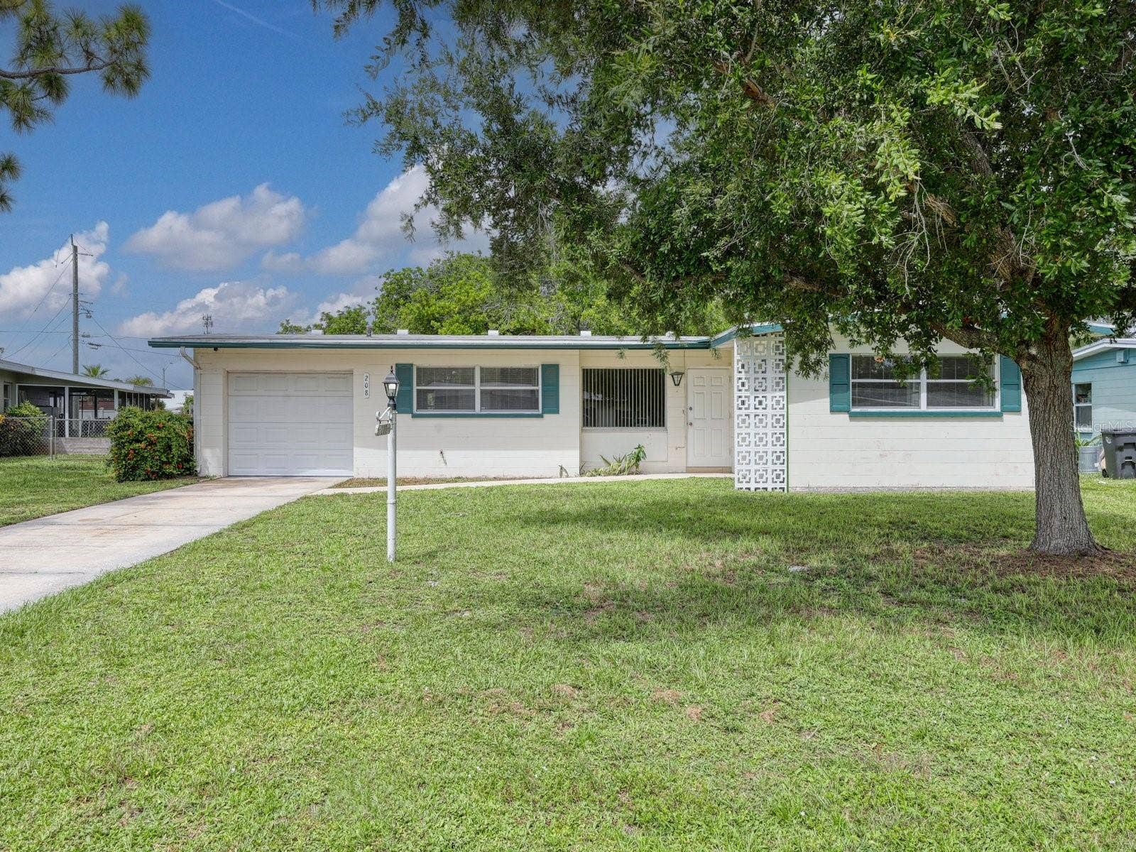 208 62ND STREET W, Bradenton, FL 34209 Large backyard to park your trailer and other toys in!