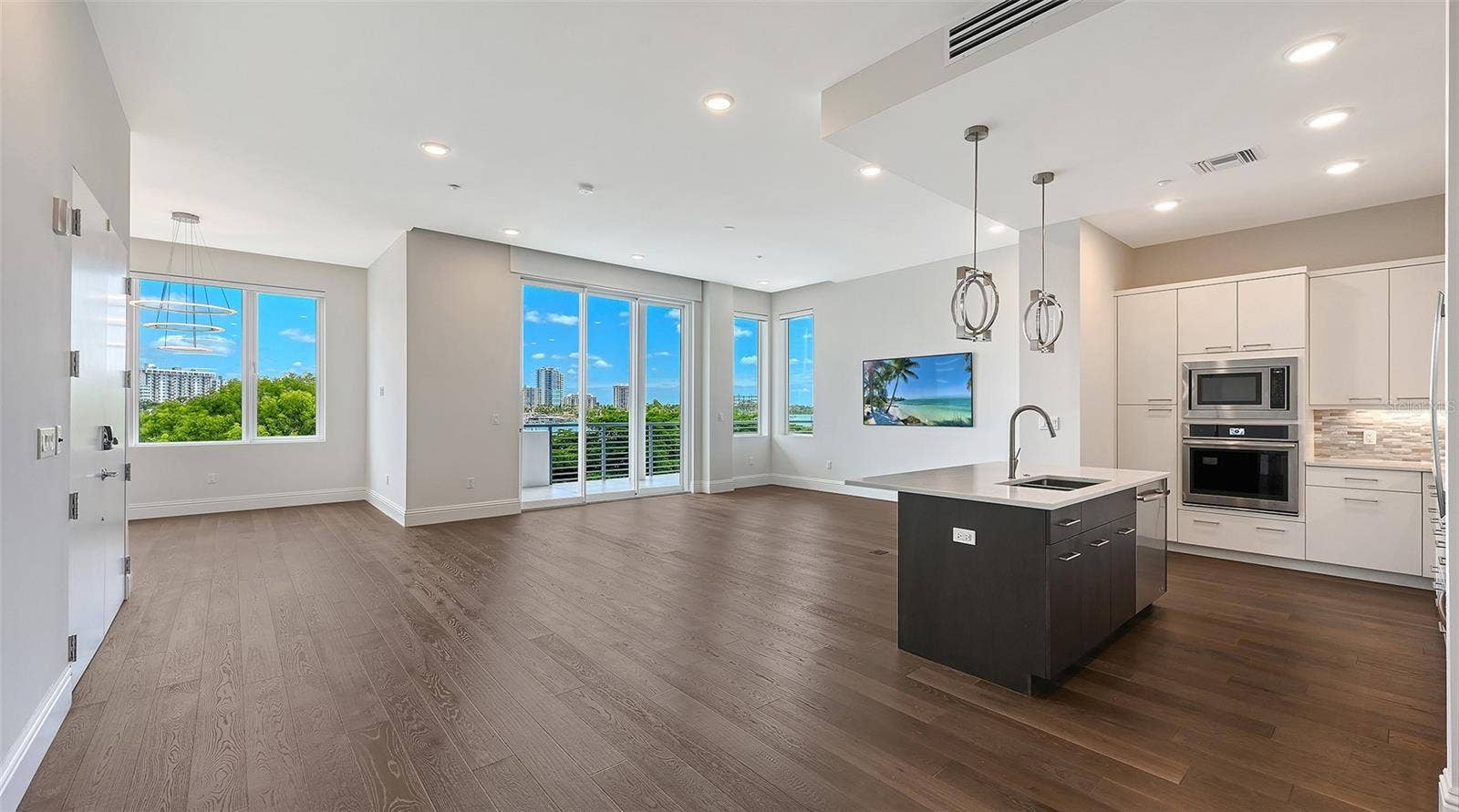 Photo of the whole living area out onto the lanai.