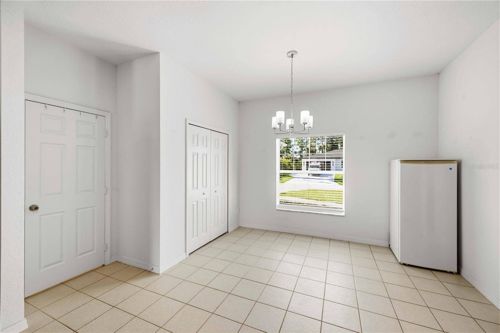 1150 KNOTTY PINE AVENUE, North Port, FL 34288 Pantry to the left and eat in kitchen area