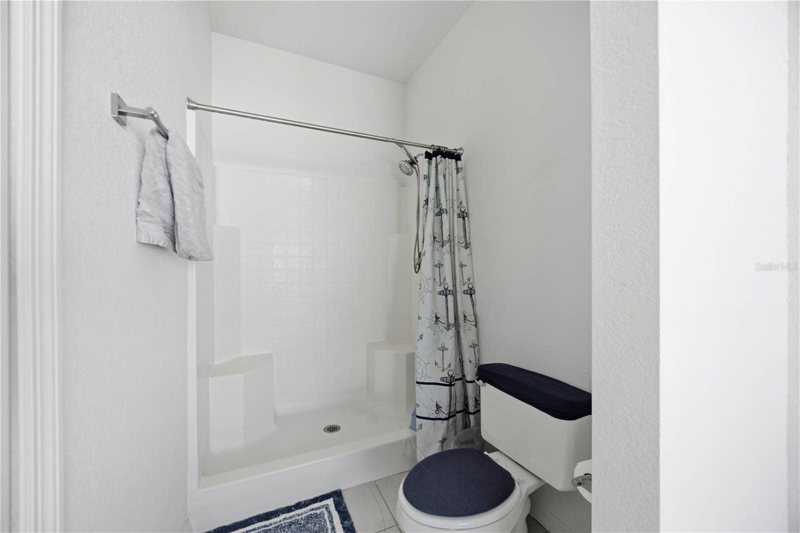 1150 KNOTTY PINE AVENUE, North Port, FL 34288 Walk in shower and cammode area