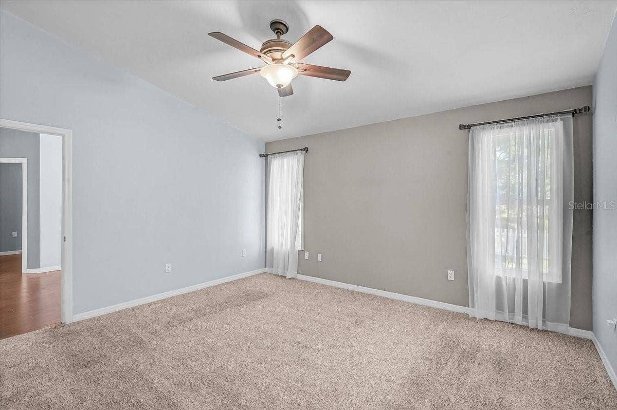7739 33RD LANE E, Sarasota, FL 34243 Primary Bedroom Overlooking Pond