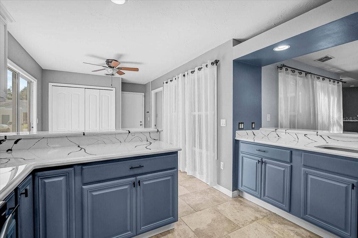 7739 33RD LANE E, Sarasota, FL 34243 Kitchen Looking into Dinette and Dining Room