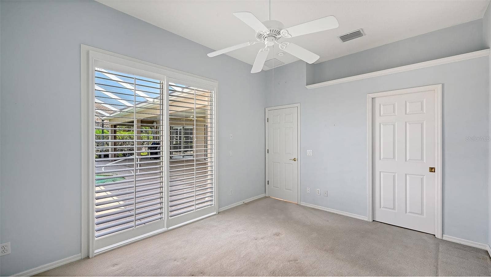 335 PARK TRACE BOULEVARD, Osprey, FL 34229 Guest Bedroom and pool door