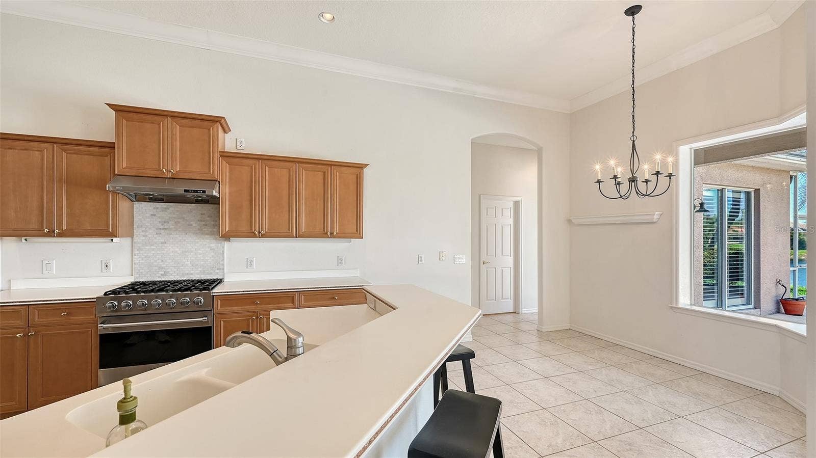 335 PARK TRACE BOULEVARD, Osprey, FL 34229 Informal eating in Kitchen with pool view