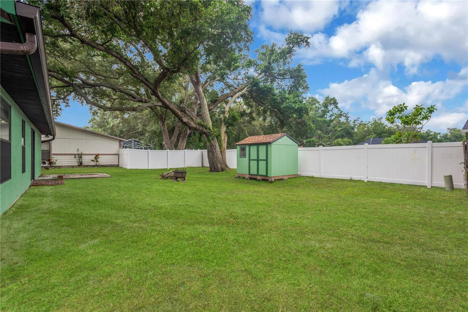 5546 34TH COURT E, Bradenton, FL 34203 Large backyard with shed