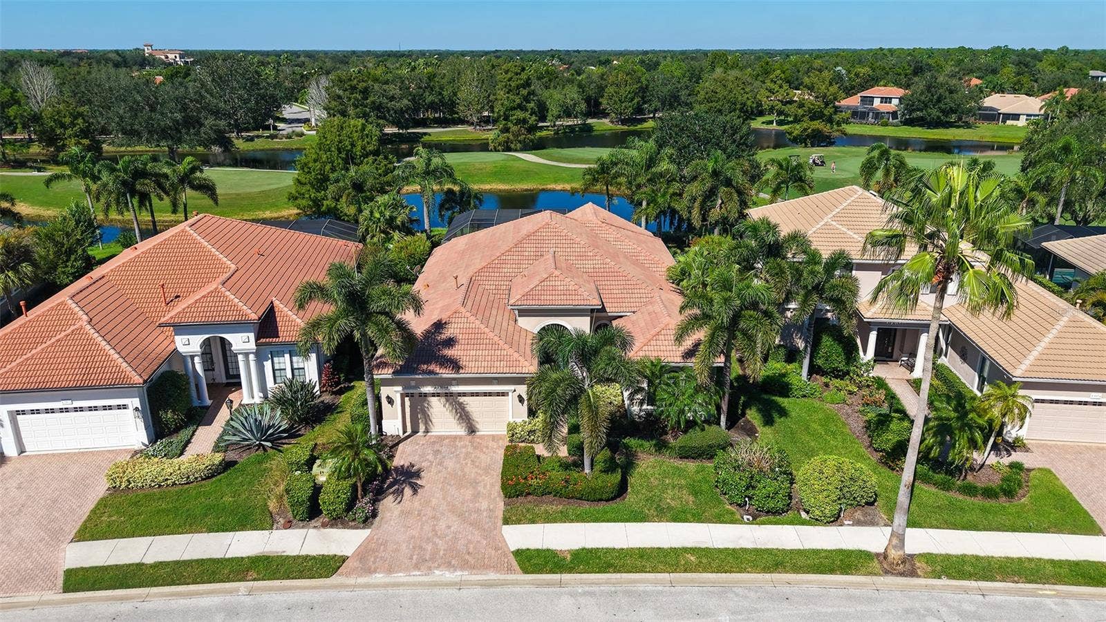 13978 SIENA LOOP, Lakewood Ranch, FL 34202 Set on a gorgeous lake and golf course view lot.