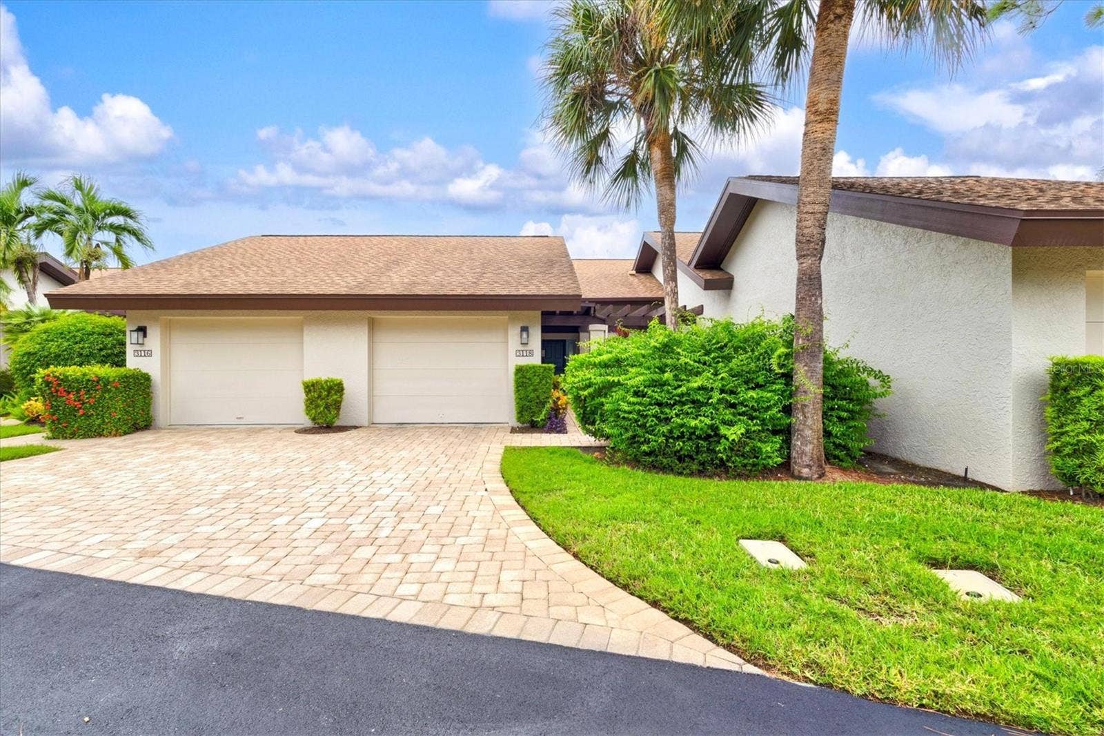 3118 WINDRUSH BOURNE, #8, Sarasota, FL 34235 Garage is the one on the right