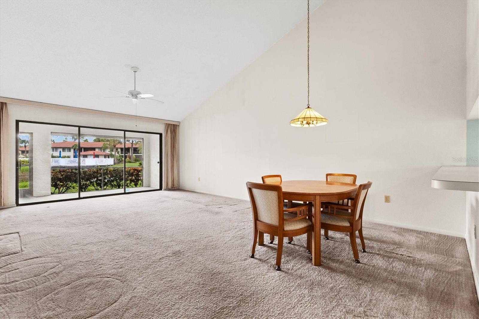 3118 WINDRUSH BOURNE, #8, Sarasota, FL 34235 dining/living room