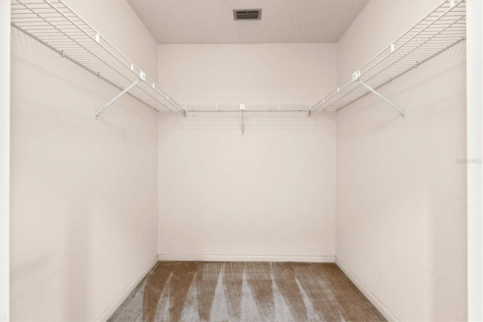 3118 WINDRUSH BOURNE, #8, Sarasota, FL 34235 primary closet