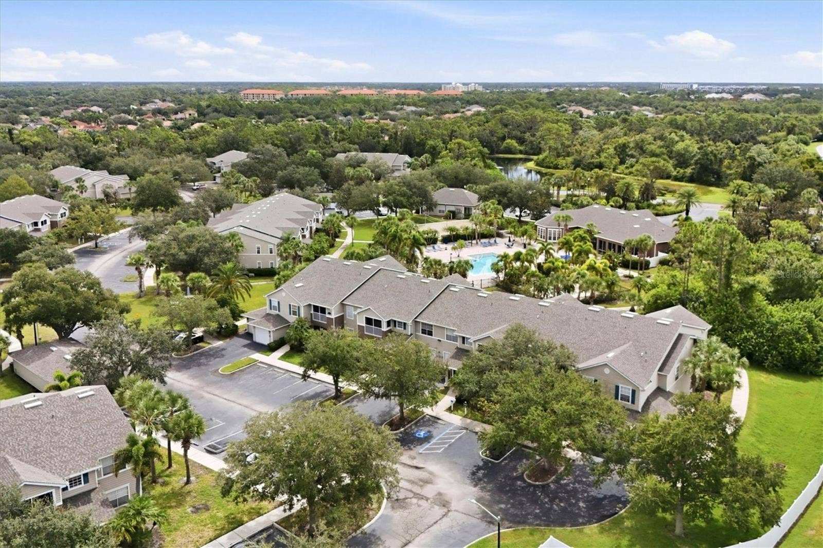 8926 MANOR LOOP, #103, Bradenton, FL 34202 Community Pool and Fitness nestled directly behind this property.