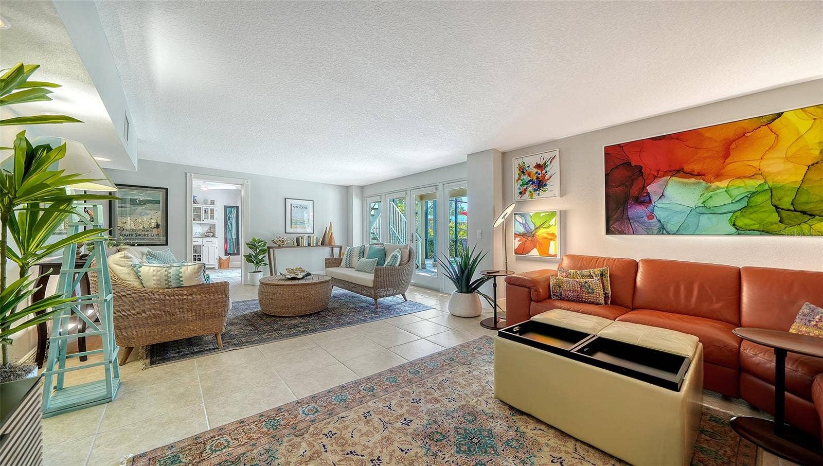 Bright family room creates a comfortable second living and entertaining area.