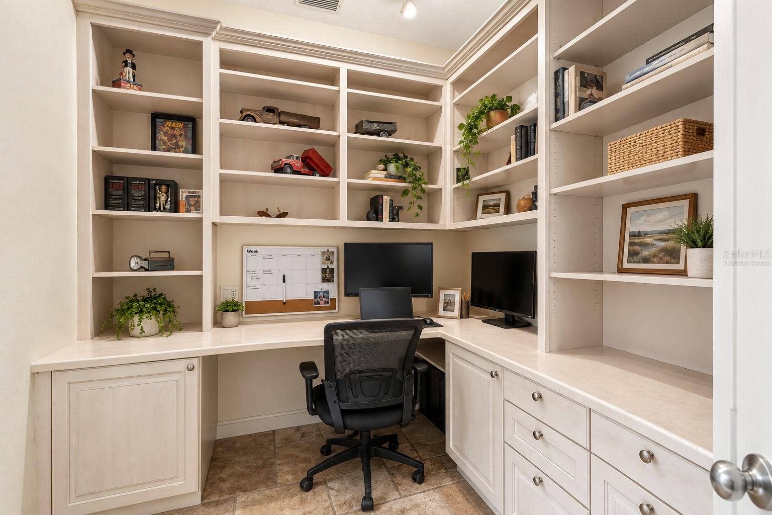 OFFICE WITH LARGE BAY WINDOW WITH A TROPICAL VIEW- virtually staged