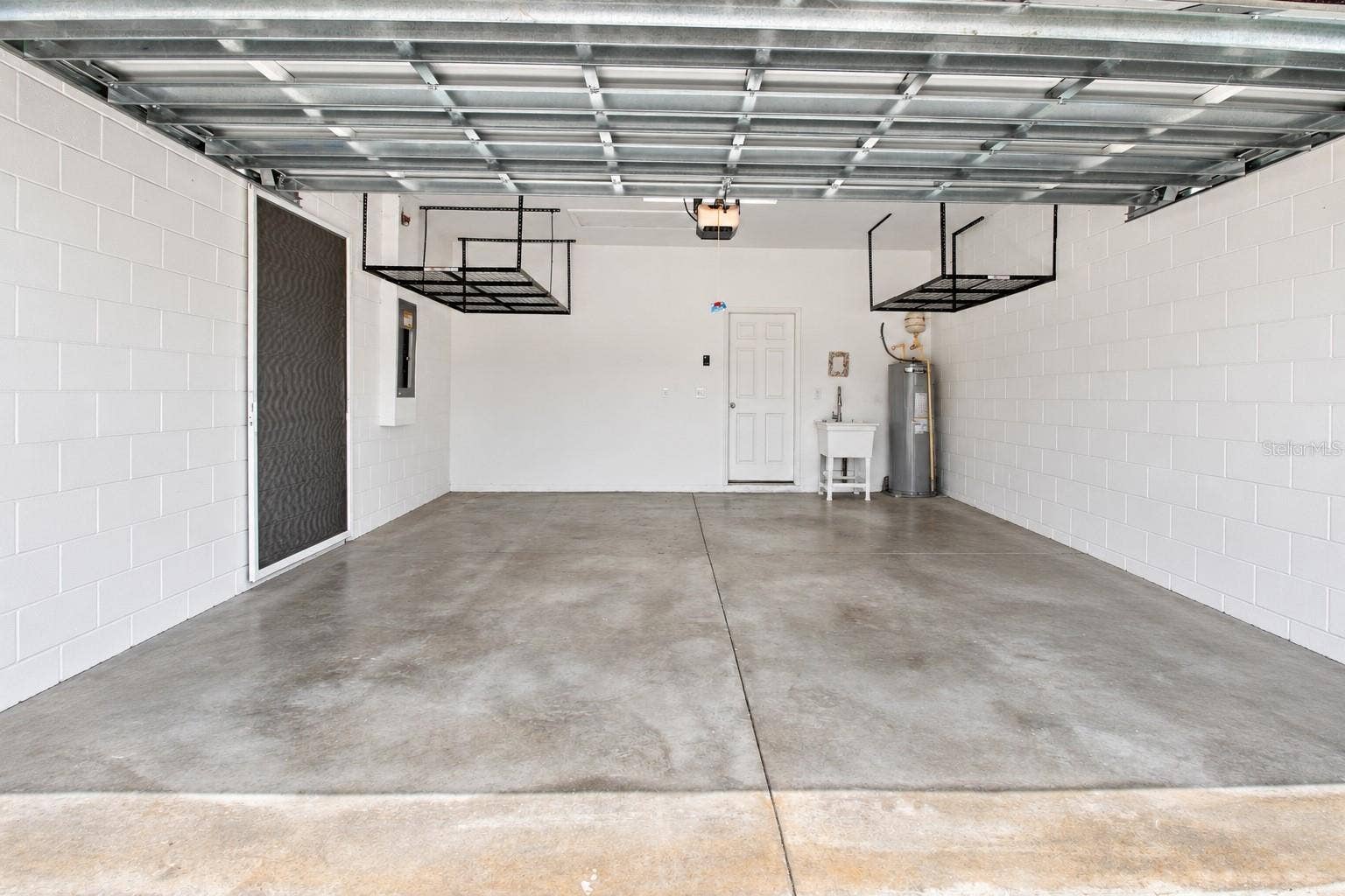 5706 MEZZANA RUN, Palmetto, FL 34221 Garage - Some Virtual Staging