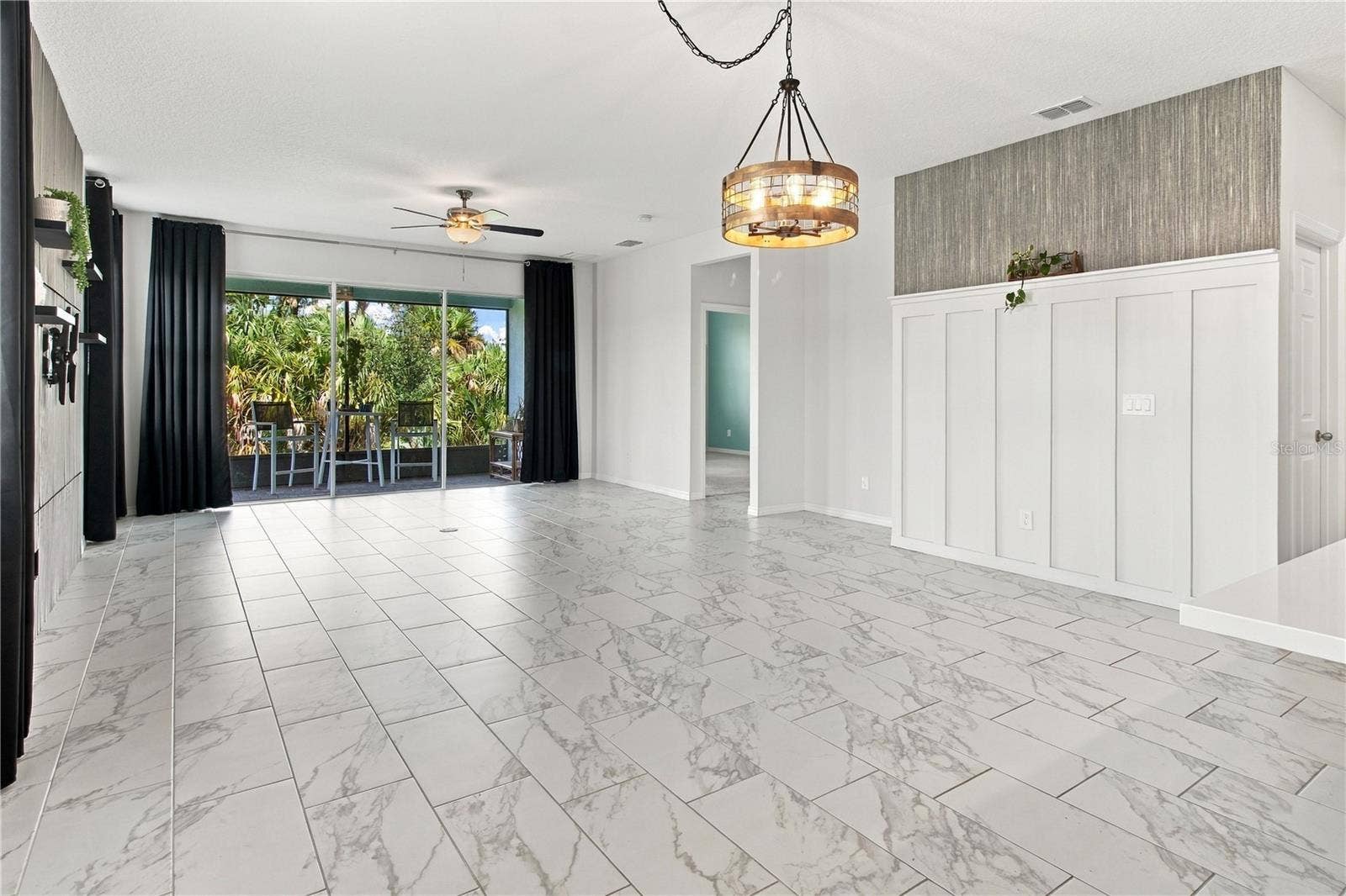 5706 MEZZANA RUN, Palmetto, FL 34221 Living & Dining Area w/Wall Accents