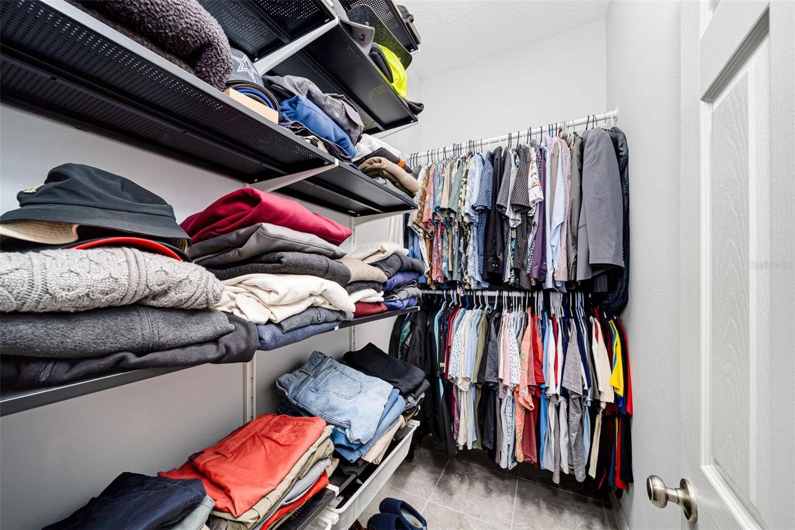 Enjoy the convenience of dual walk-in closets with dedicated storage for two.