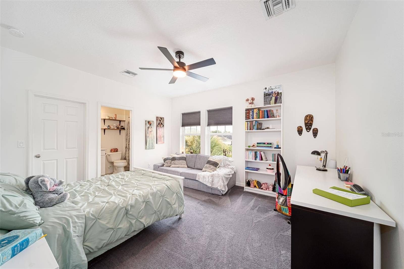 Spacious secondary bedroom with the convenience of a private en-suite bath.