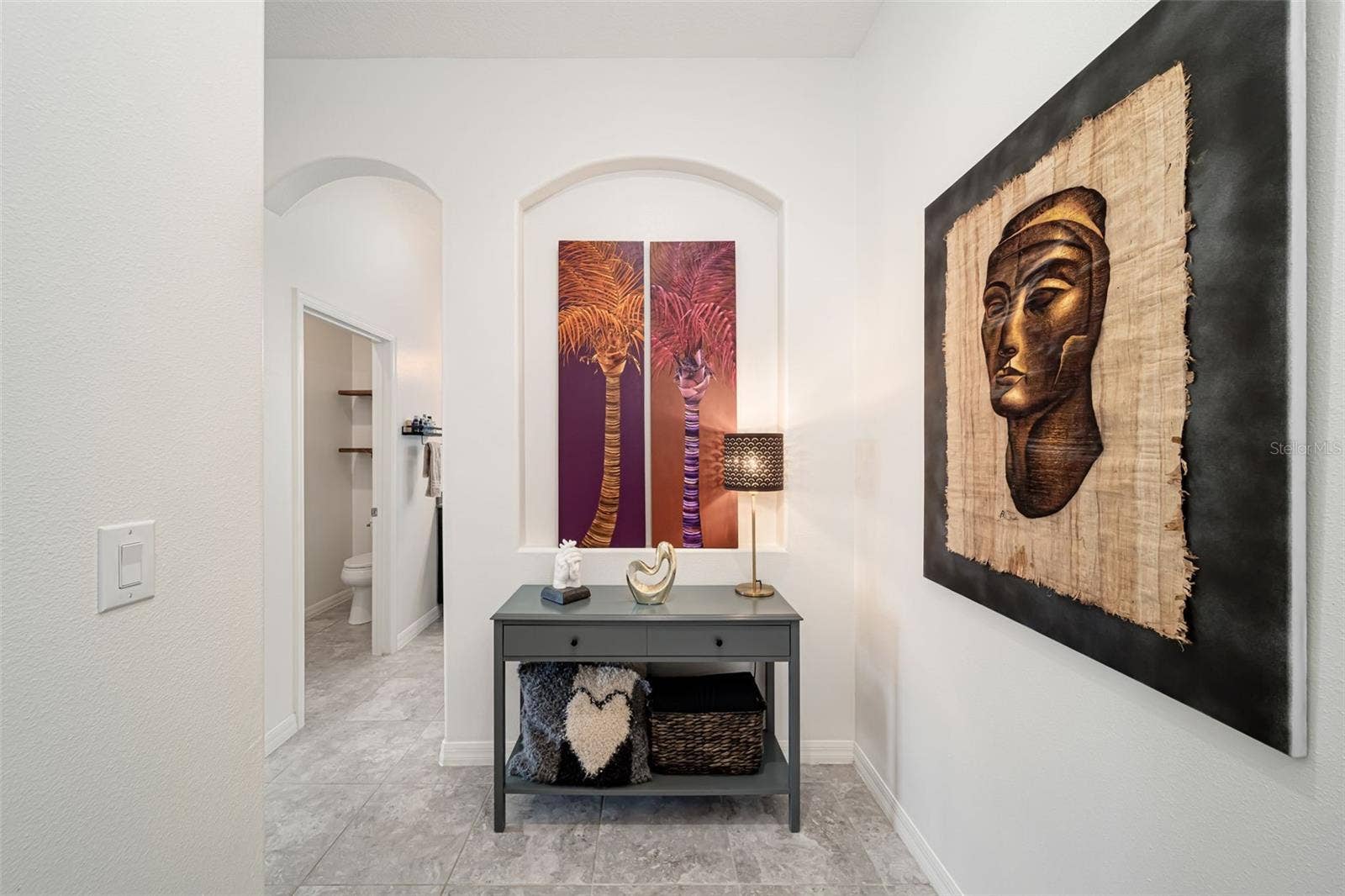 Privately situated primary suite conveniently located on the first floor.