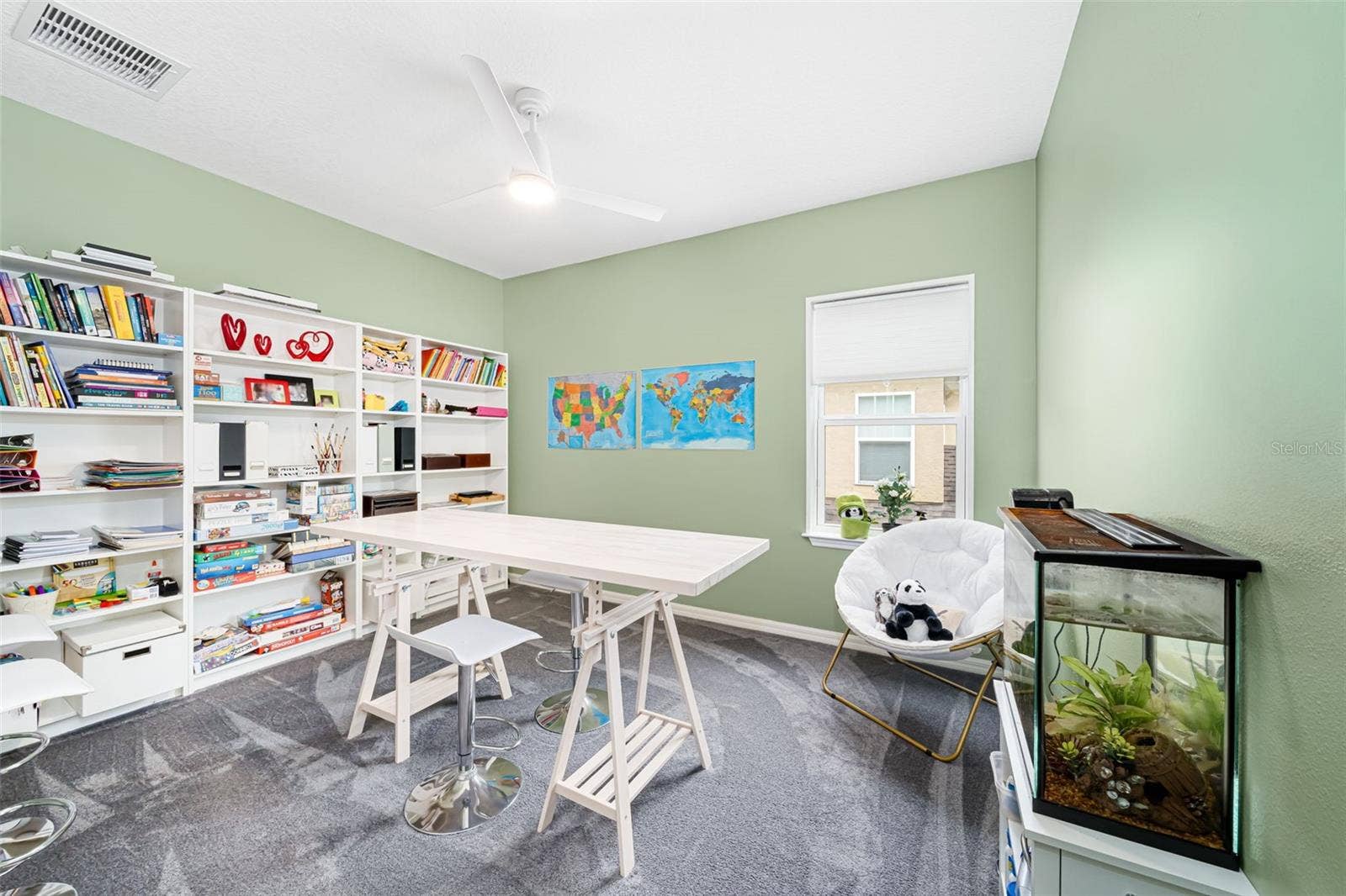 Versatile additional bedroom currently set up as a dedicated homework and study space.