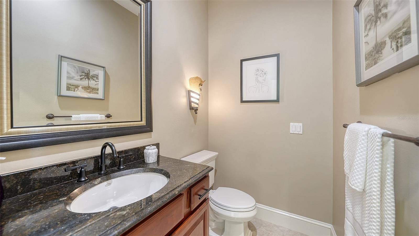 2115 LYCHEE LANE, Nokomis, FL 34275 powder room off the kitchen area