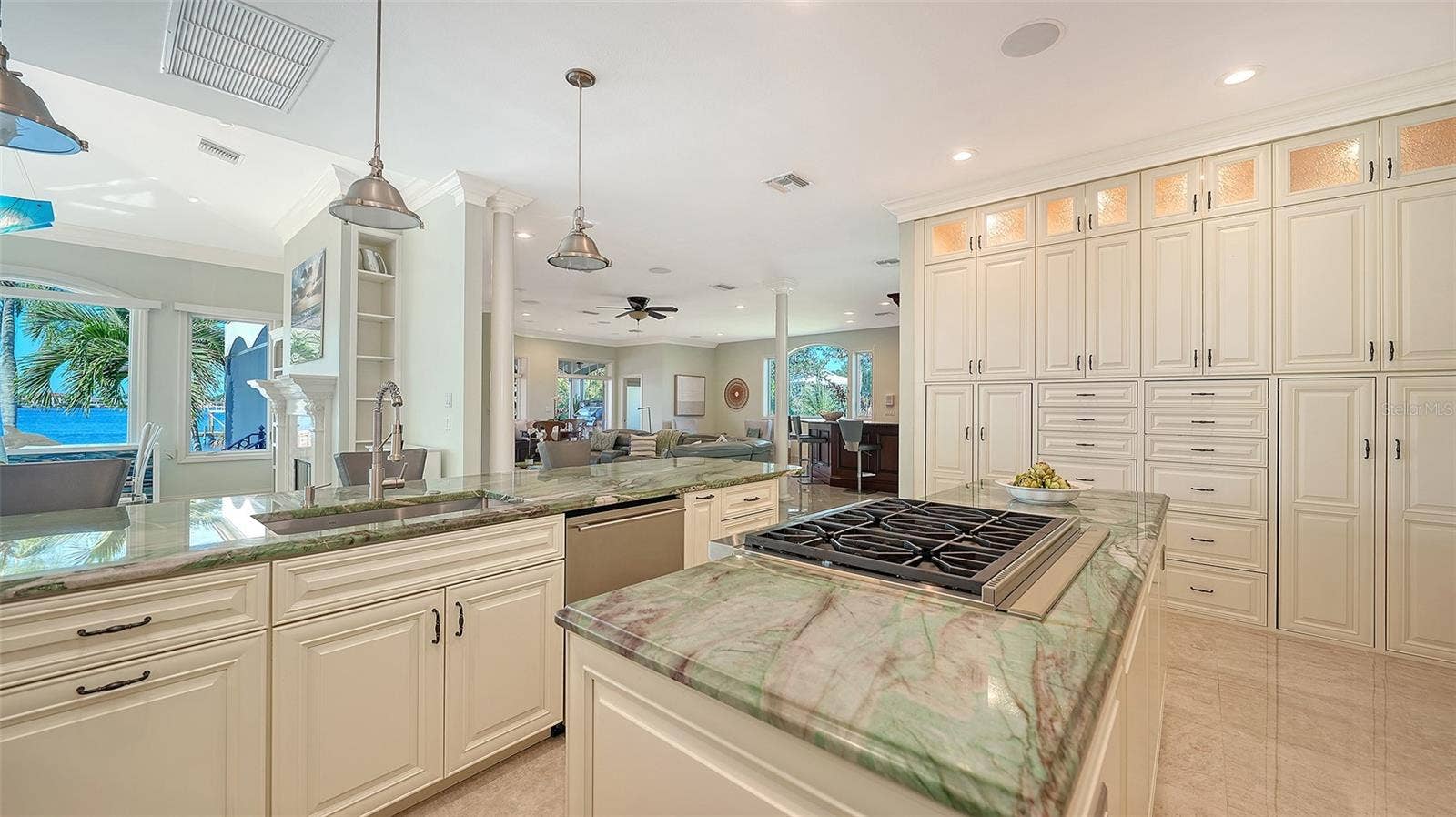 2115 LYCHEE LANE, Nokomis, FL 34275 floor to ceiling cabinets, kitchen opens to family room