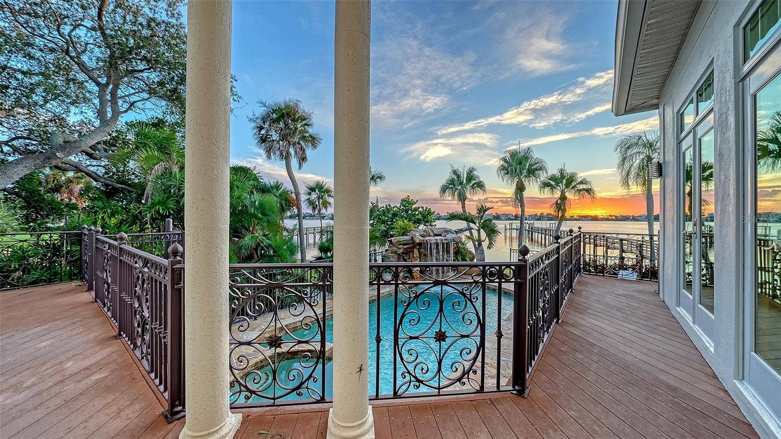 2115 LYCHEE LANE, Nokomis, FL 34275 Deck along first floor level connecting all the living spaces