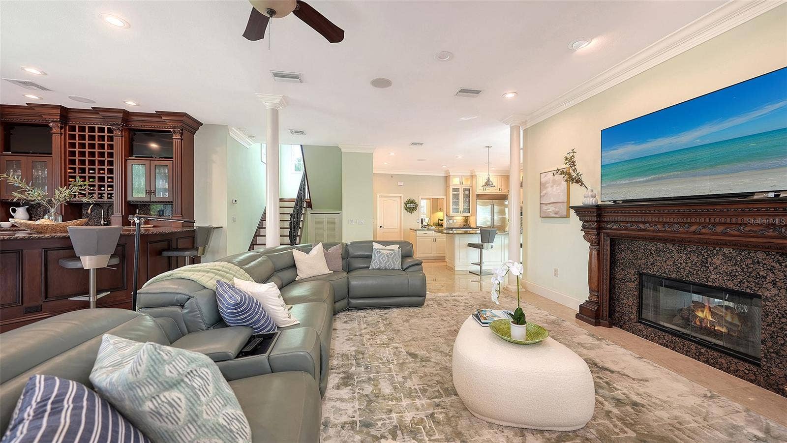 2115 LYCHEE LANE, Nokomis, FL 34275 Family room with gas fireplace