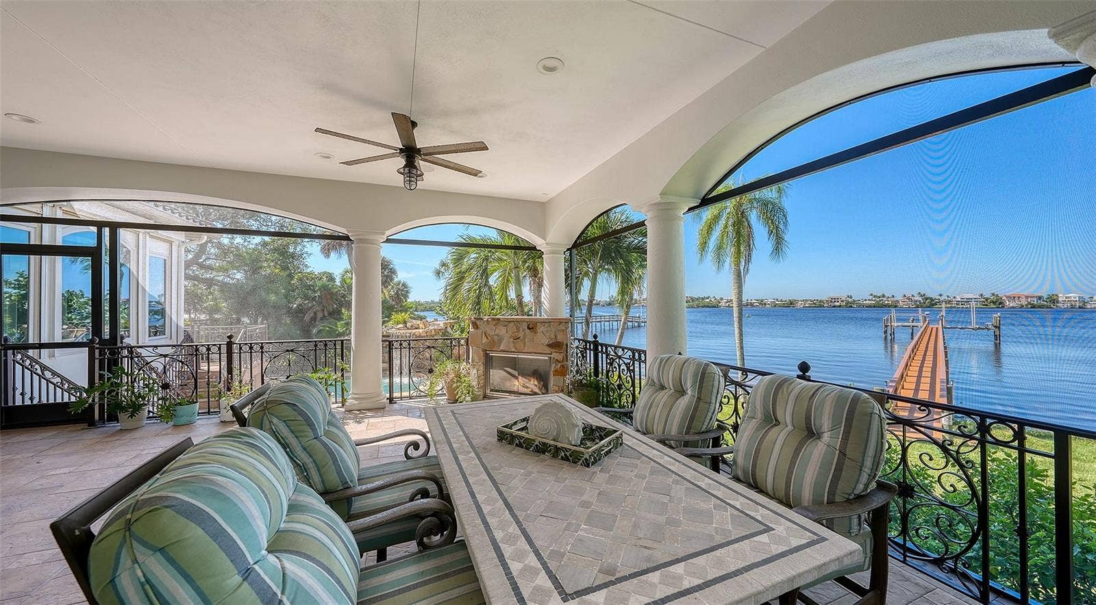 2115 LYCHEE LANE, Nokomis, FL 34275 stunning view of the water and dock and the pool area