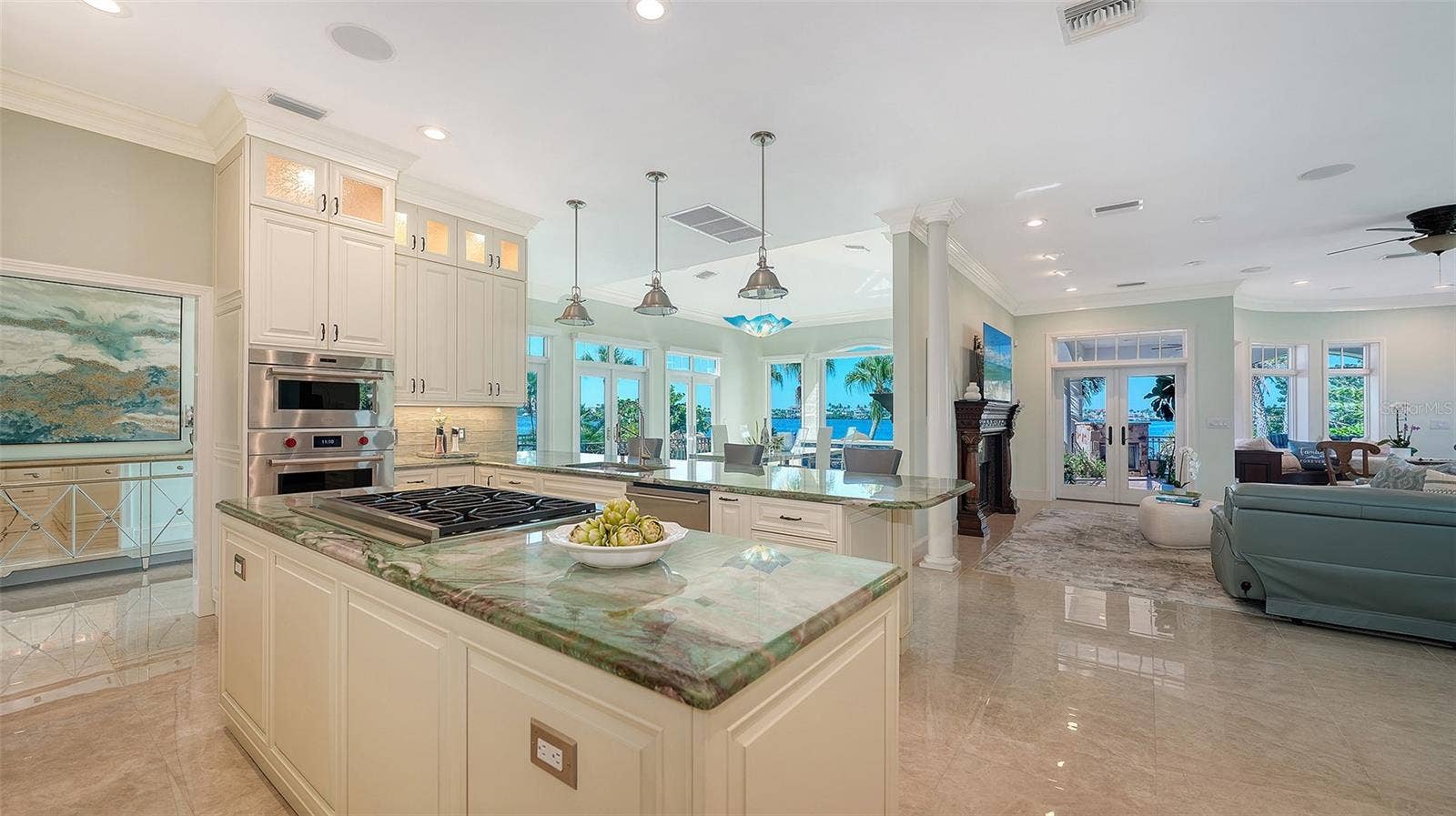2115 LYCHEE LANE, Nokomis, FL 34275 Kitchen looking out to the living area and dining room and expansive waterviews