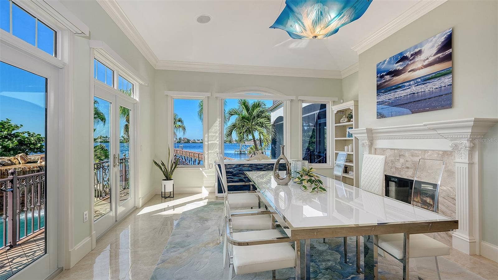 2115 LYCHEE LANE, Nokomis, FL 34275 formal dining room with walls of windows to the water