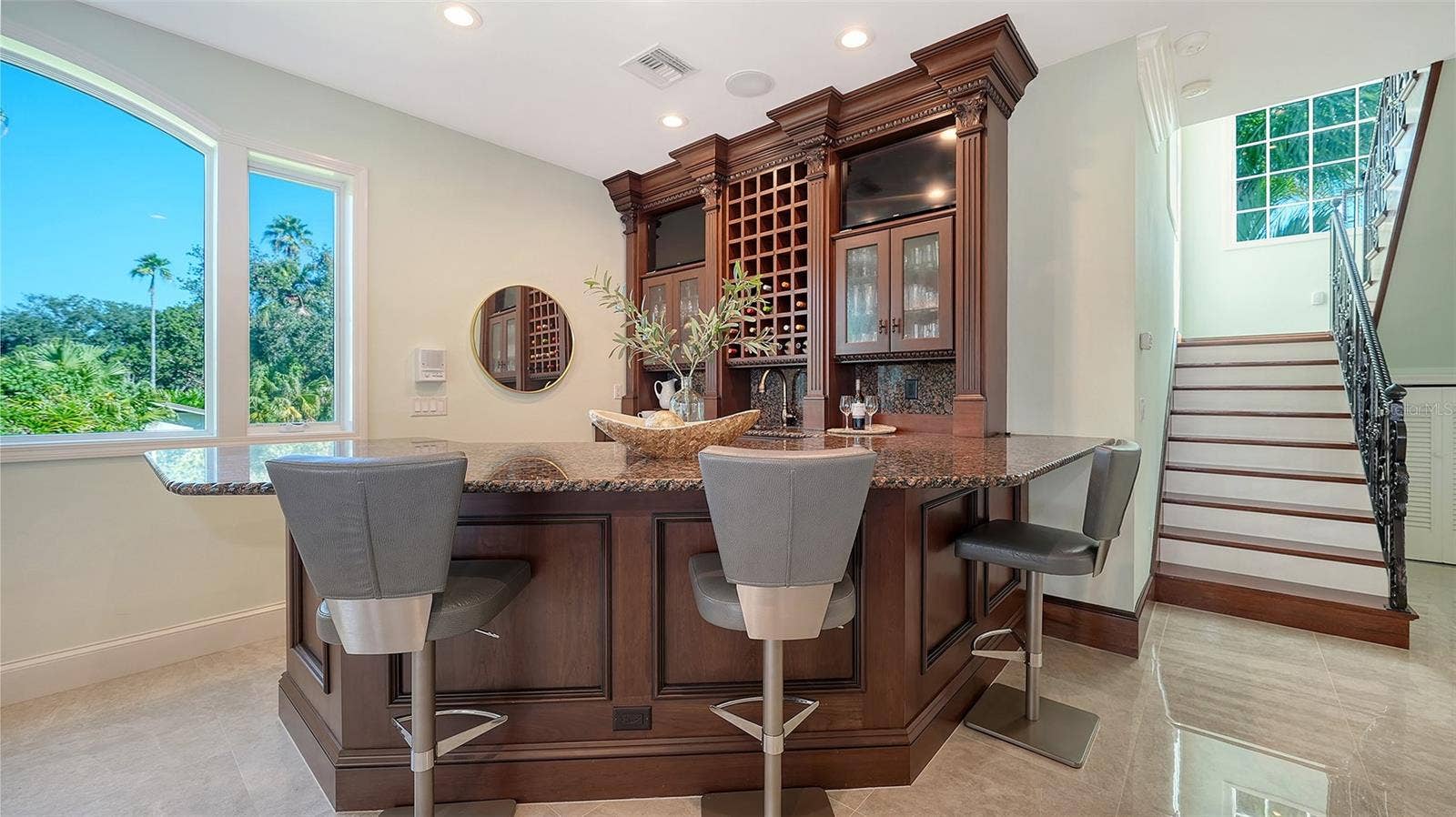 2115 LYCHEE LANE, Nokomis, FL 34275 custom bar ideal for entertaining, stairs lead to second floor private owners suite
