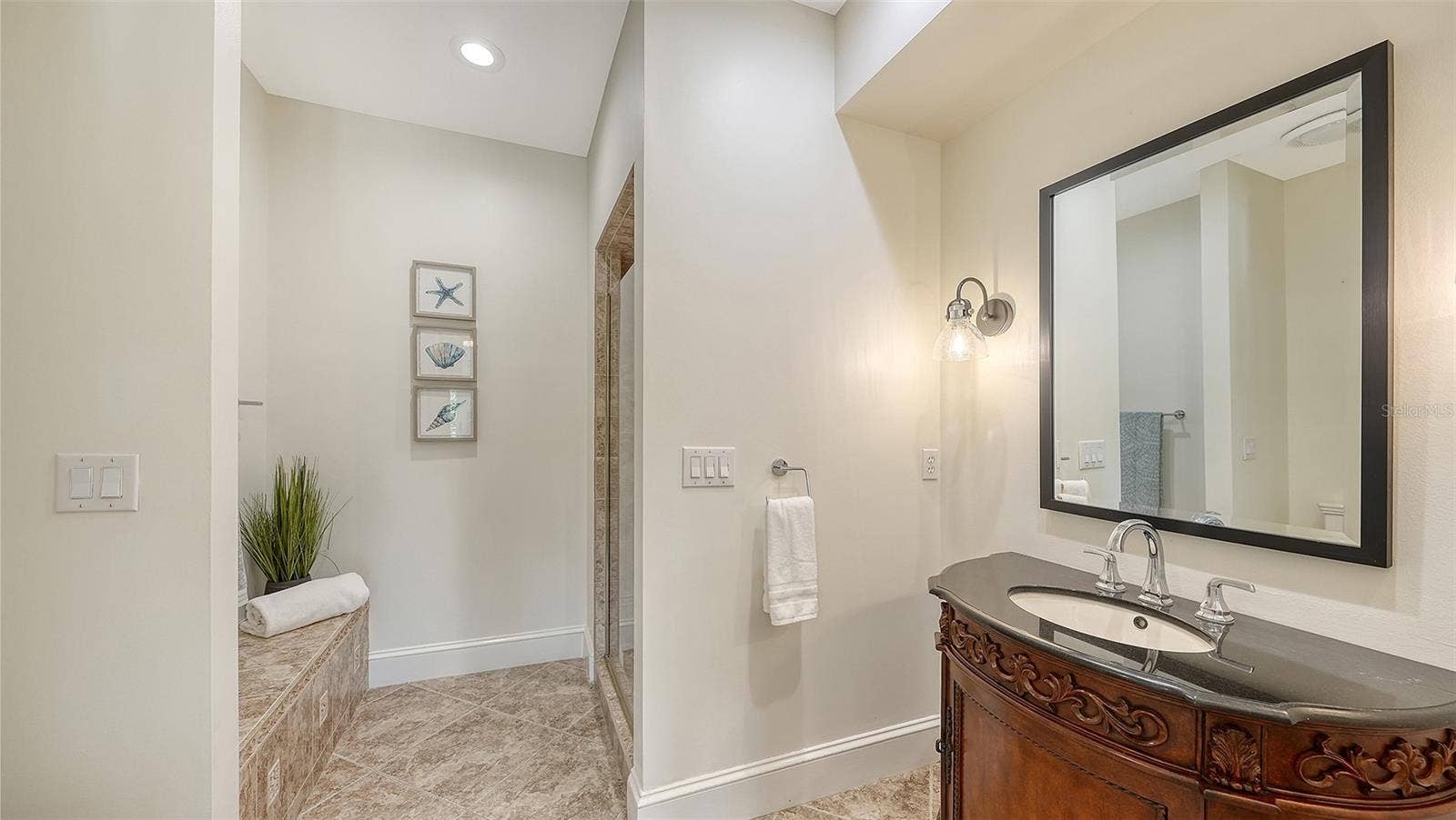 2115 LYCHEE LANE, Nokomis, FL 34275 en suite for the guest bedroom with walk in shower